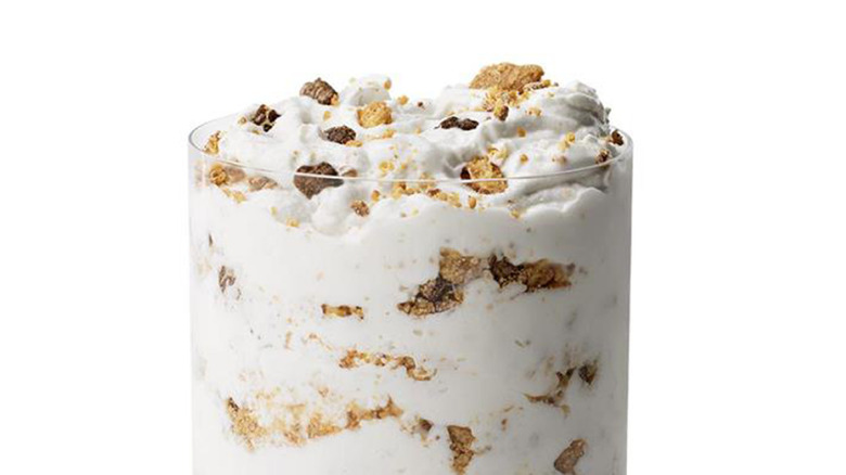 Peanut butter crunch McFlurry from McDonalds in a clear glass