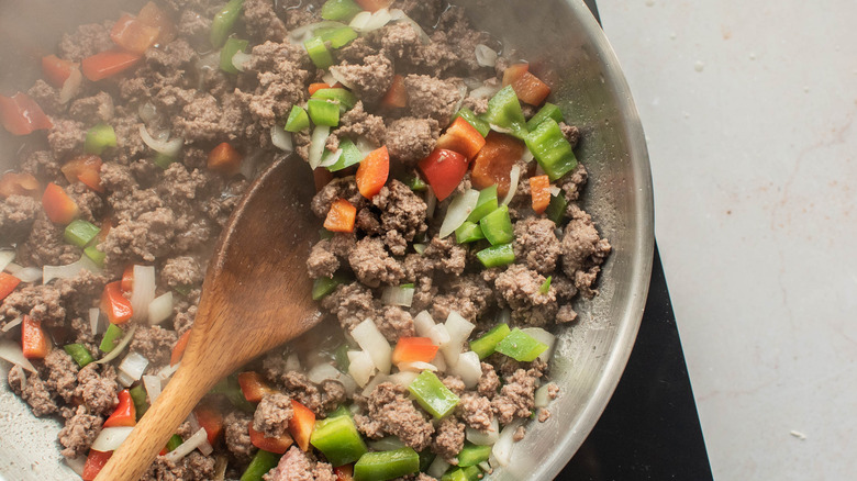 cooking meat and veggies