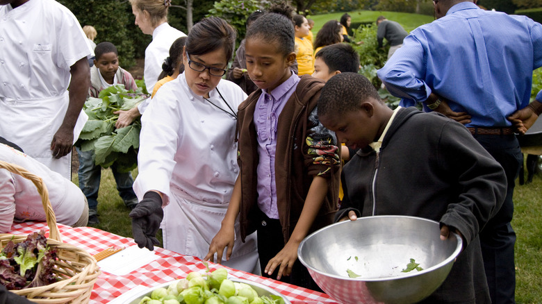 Comerford directs children in the White House garden