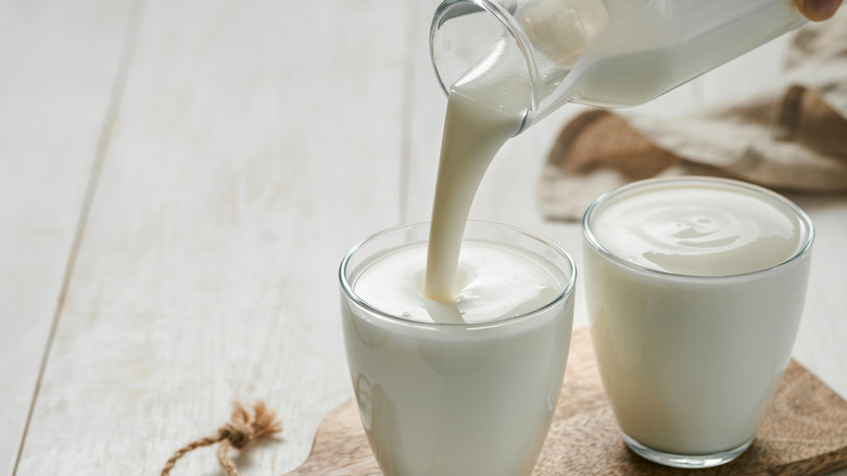 pouring buttermilk into glass
