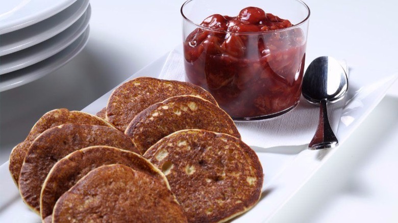 Mini latkes with cherry sauce