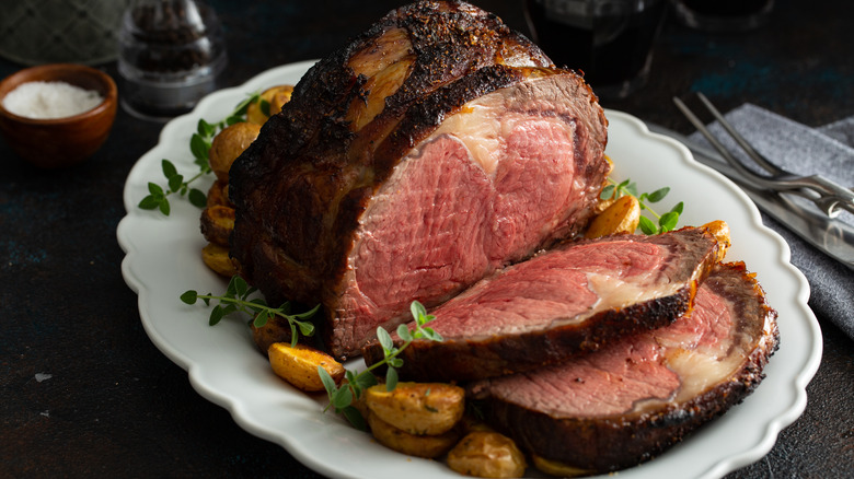 Sliced prime rib on serving plate