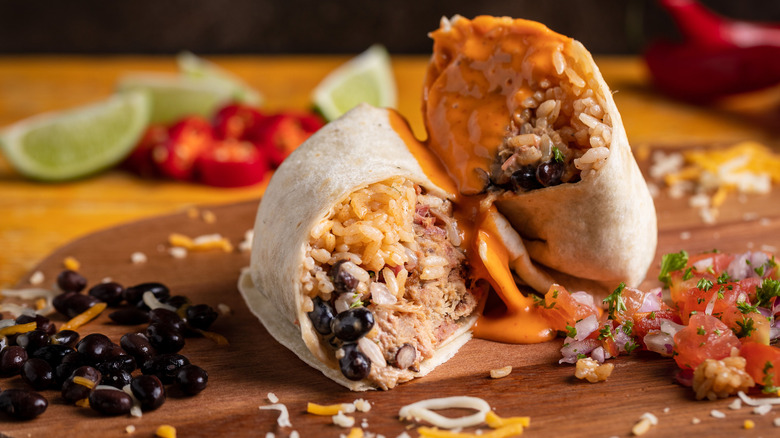 burritos on a wooden plate
