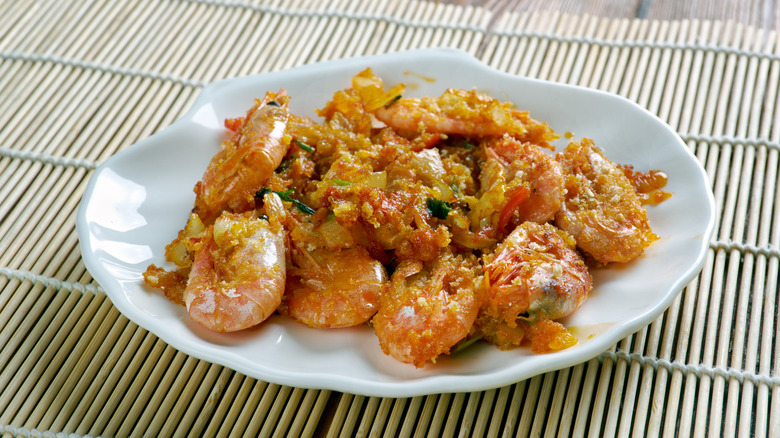 A white plate filled with Shrimp DeJonghe