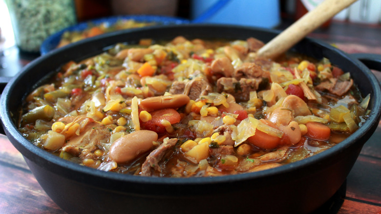 Black bowl filled with Kentucky burgoo