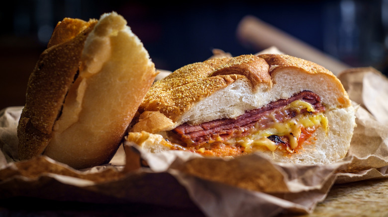 Close up of a Taylor ham sandwich on a hard roll