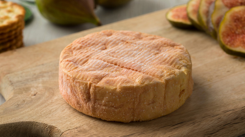 Muenster cheese on cutting board