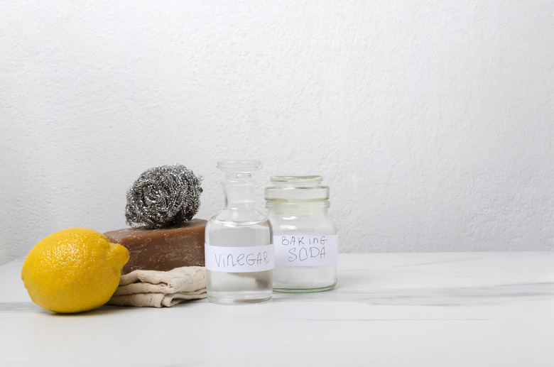 Remove labels from reusable containers with vegetable or baby oil