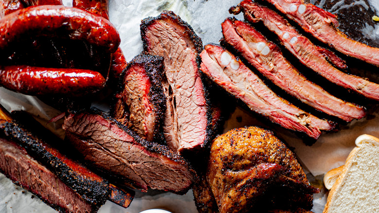 BBQ platter with ribs, brisket, chicken, and links