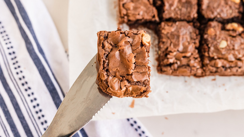 Freshly cut brownie square with crackly top