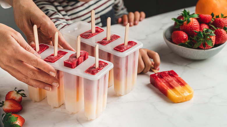 Woman making popsicles