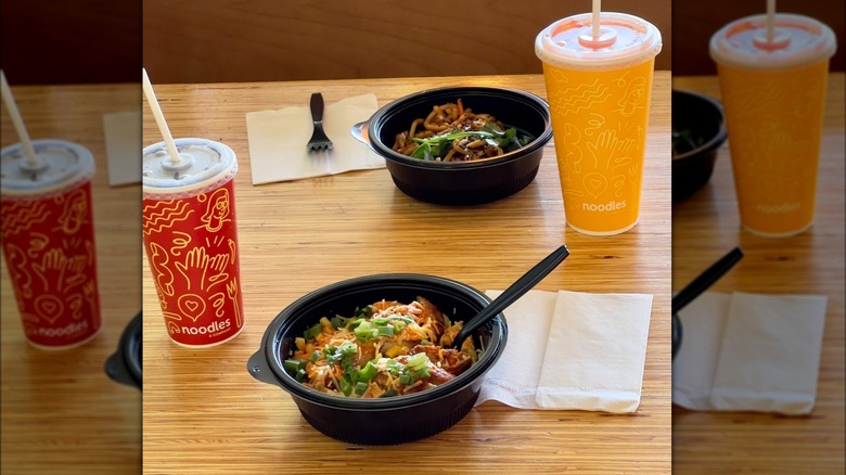 bowl of noodles and drink
