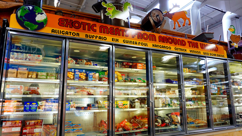 Freezer section of "exotic meats from around the world" including alligator and kangaroo