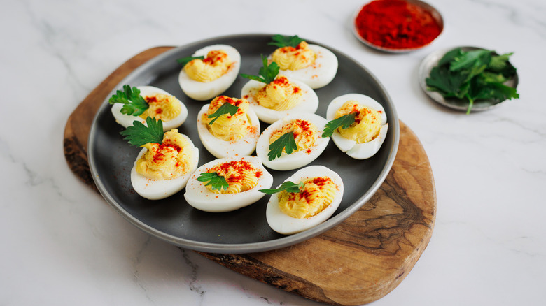 deviled eggs with garnish