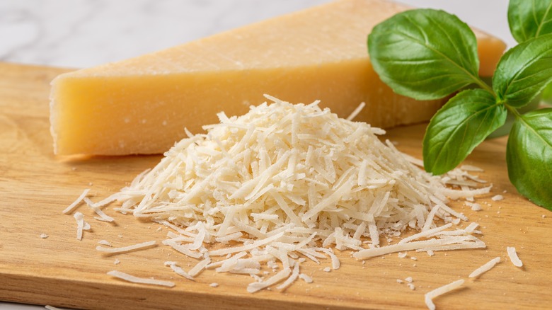 Grated cheese on board