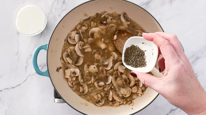 bowl of seasoning over skillet