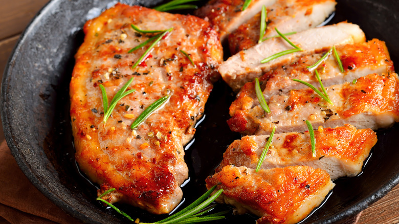 cooked pork in frying pan