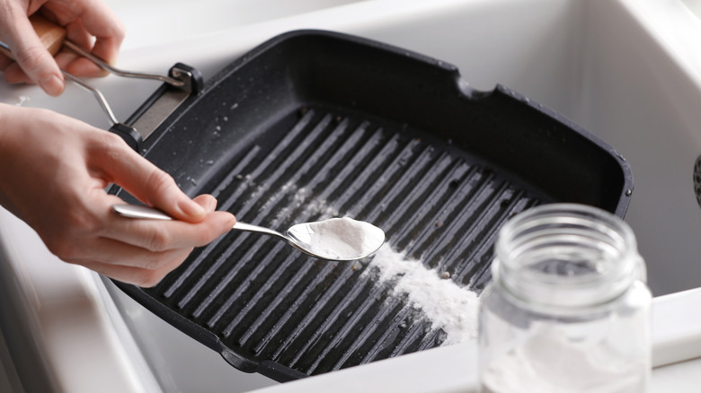 Spoonful of baking soda on a pan