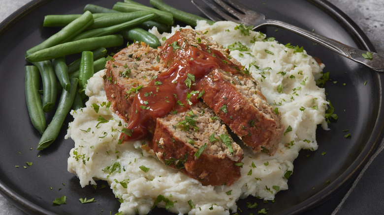 Meatloaf over mashed potatoes