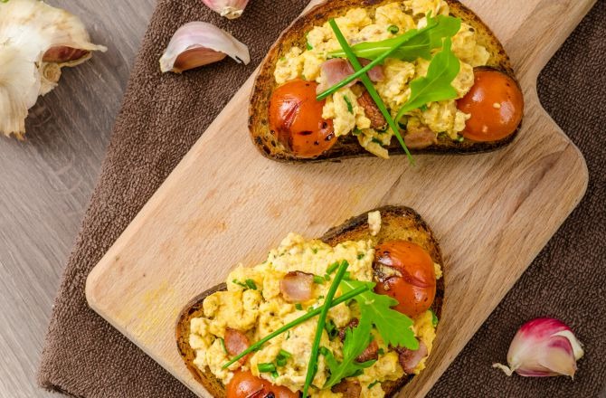 Opened face scrambled egg sandwhich