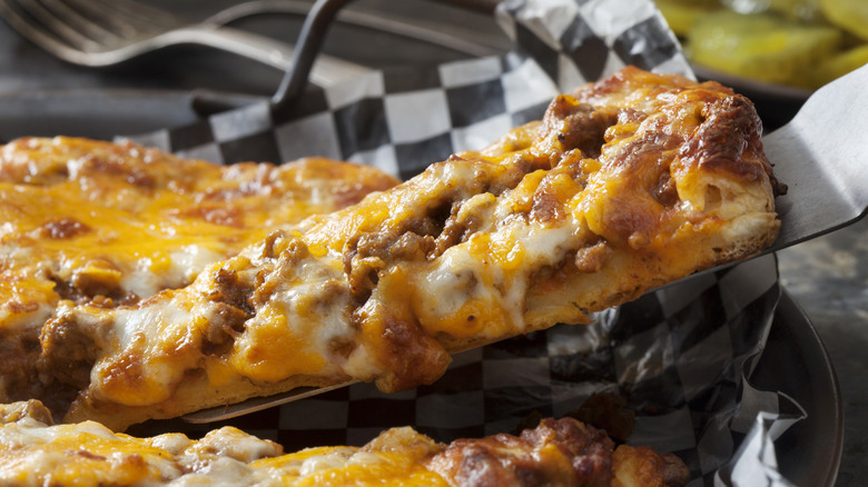 Slice of cheeseburger pizza