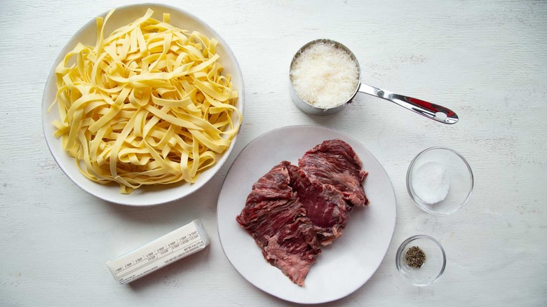 Steak Alfredo ingredients on counter