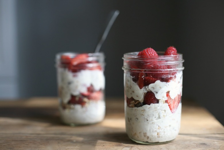 Overnight oats recipe - yogurt, muesli, fruit in a mason jar