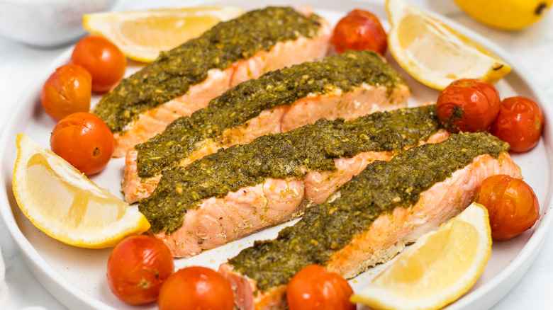 pesto salmon filets on a plate