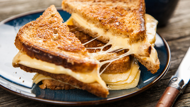 Grilled cheese sandwiches split open