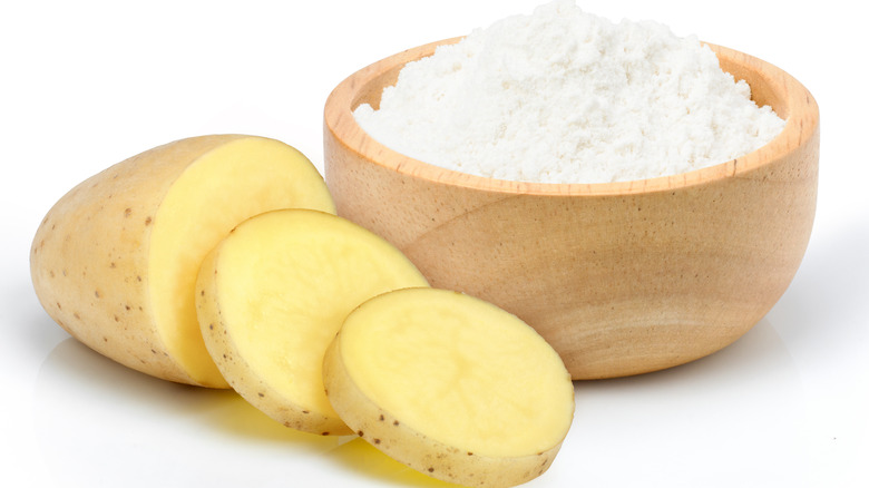 Potatoes and bowl of starch