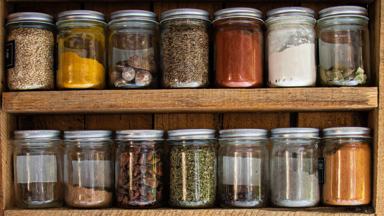 Two rows of spice jars
