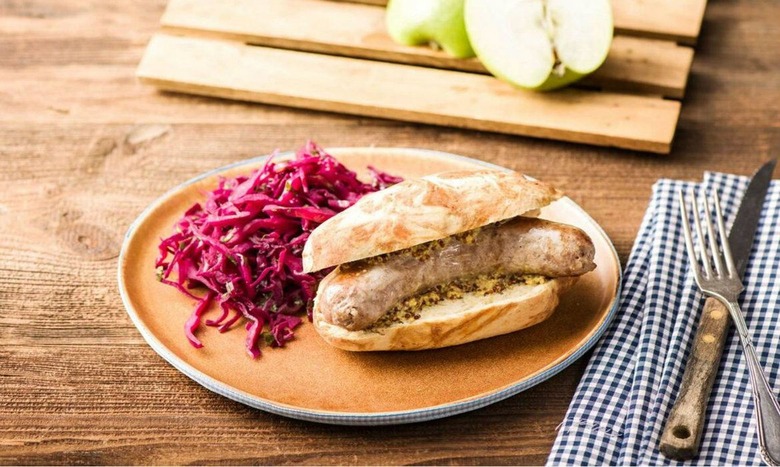 Pretzel Bun Bratwursts with Tangy Apple-Cabbage Slaw