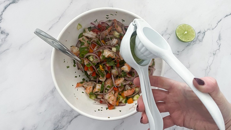 citrus squeezer over bowl