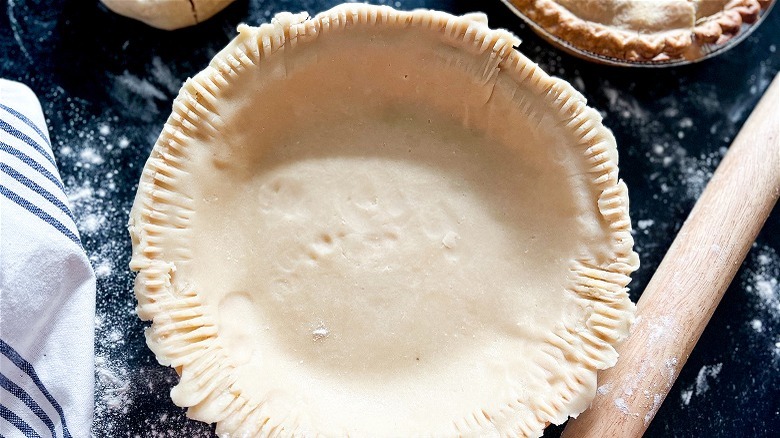 empty pie crust in pan 