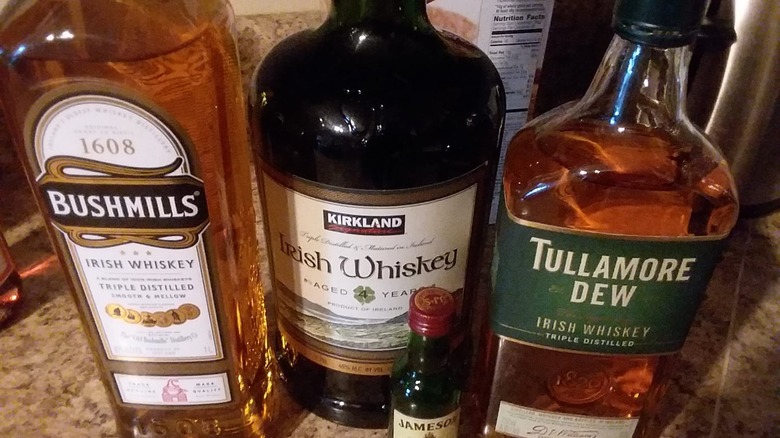 Three bottles of different whiskey