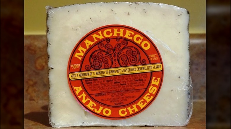 Manchego Añejo Cheese in plastic