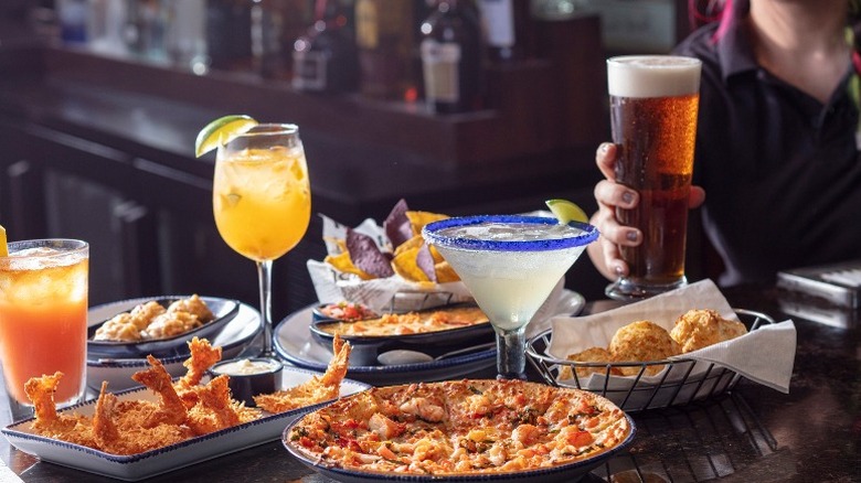 Bartender with appetizers