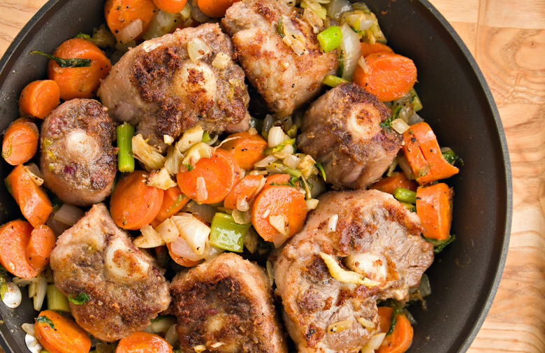 Red wine braised oxtails with butternut squash and pearl onions