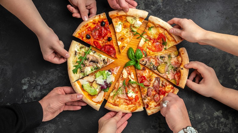 Multiple kinds of pizza slices