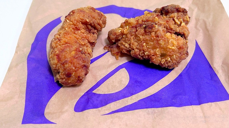Close up of two Taco Bell Crispy Chicken Strips
