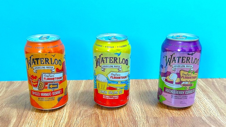 Cans of Waterloo Sparkling Water and Guy Fieri's Flavortown flavors
