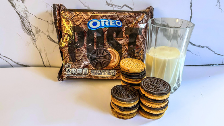 Post Malone Oreos stacked next to a glass of milk