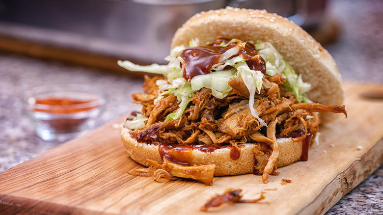 Pulled pork sandwich on board