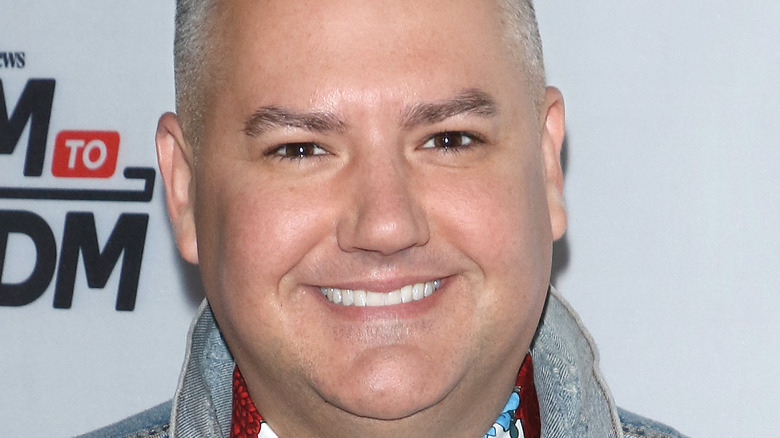 Ross Mathews smiling for press