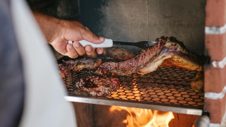 red meat on open flame grill