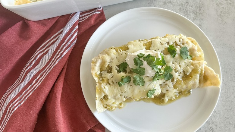 enchiladas with cilantro on plate