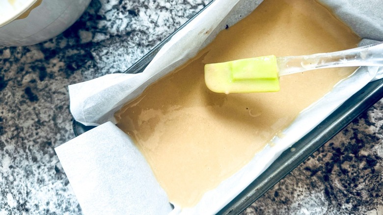 khaki-colored substance with spatula