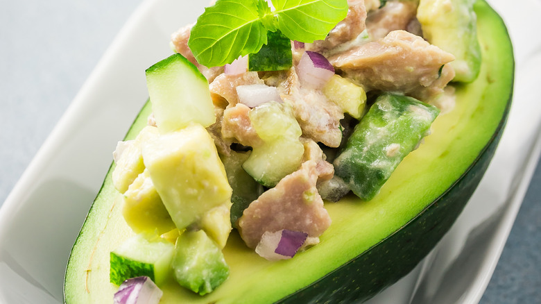 Avocado stuffed with chunk tuna salad
