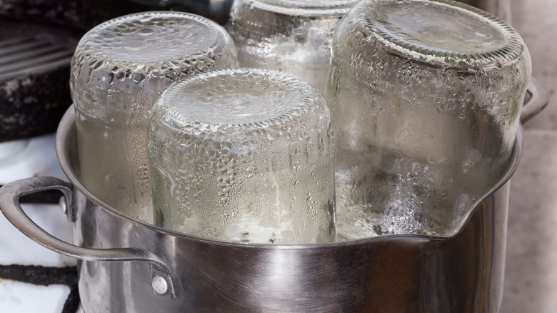jars in pot being sterilized