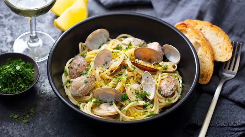 Seafood spaghetti with clams and fresh chopped parsley